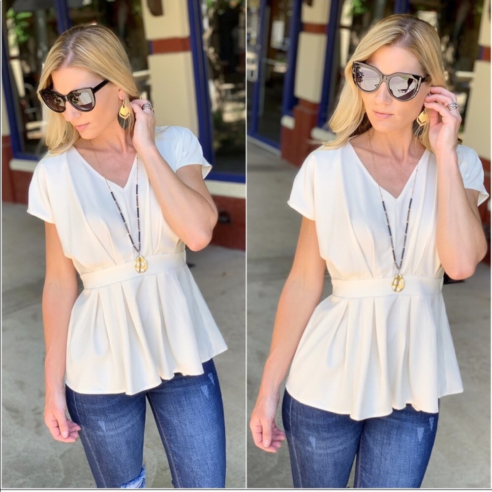 Cream pleated peplum top